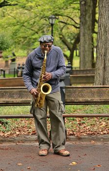 NEW YORK CITY - OCTOBER 9: A saxaphonist busking in Central Park's Bethesda Terrace, a popular tourist attraction October 9, 2012 in New York, NY.