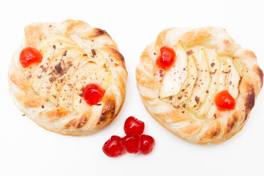 Puff pastry with apples on white background