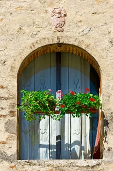 Italian Window  Decorated With Fresh Flowers