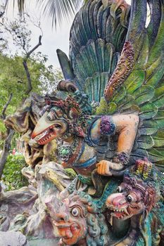 SINGAPORE - FEBRUARY 1, 2014: Garuda Hindu Statue at Haw Par Villa Theme Park. This theme park contains over 1,000 statues and 150 giant dioramas depicting scenes from Chinese mythology, folklore, legends, and history.