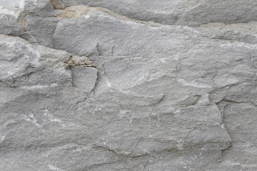 Closeup of rough grey stone texture