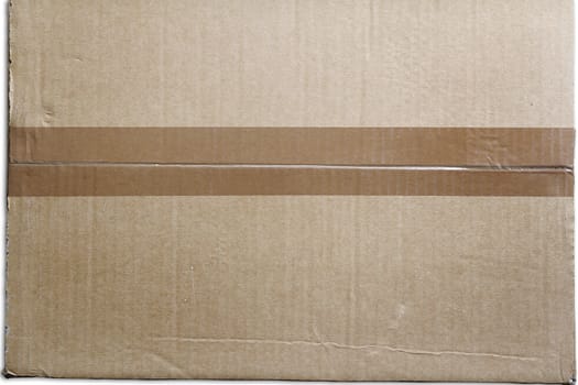 Closeup of packing tape on cardboard box 