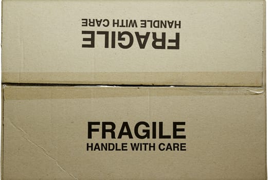 Closeup of fragile words on cardboard box 