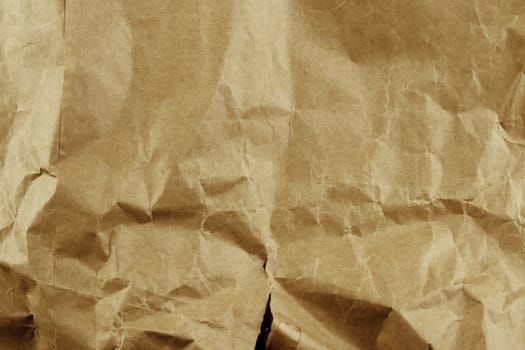 Closeup of brown wrinkled paper texture background