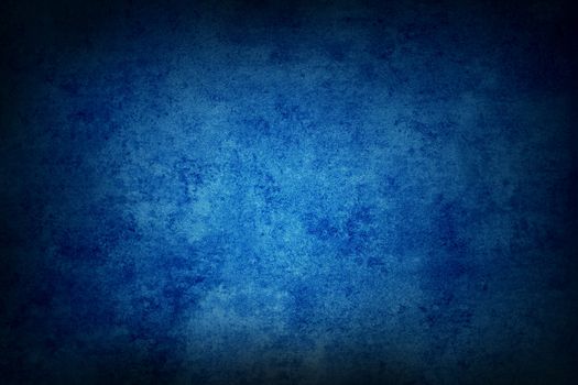 Blue grunge textured wall closeup