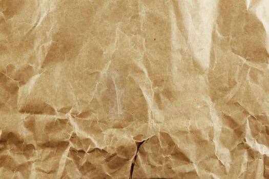 Closeup of brown wrinkled paper texture background