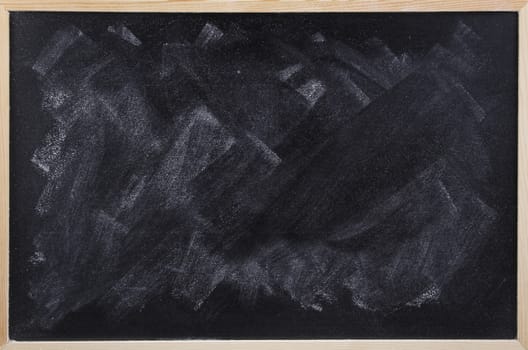 White chalk smudged on blackboard 