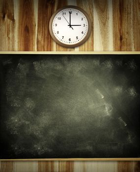 Clock and chalkboard on wall. Advertising copy space