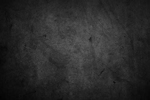 Closeup of dark grunge textured background