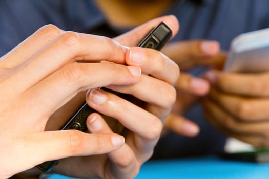 Teenage girl text messaging on her phone