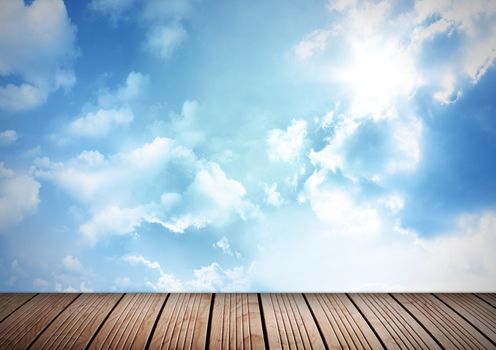 Wooden decking boards and blue sky