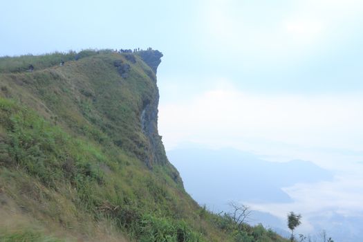 Sunrise scene with the peak of mountain and cloudscape at Phu chi fa in Chiangrai,Thailand