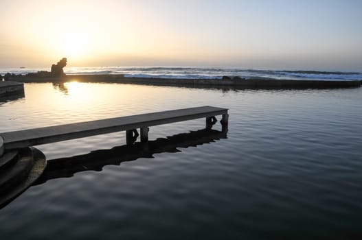 Sunset on a Pool near The Atlantic Ocean