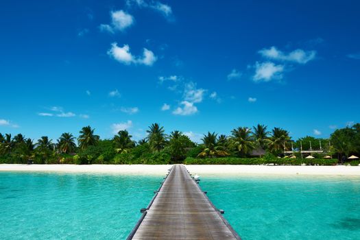 Beautiful beach with jetty at Maldives