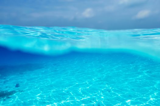 A white sand bottom in clear water at Maldives