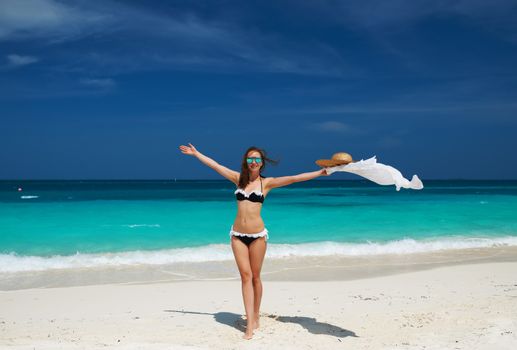 Woman in bikini at tropical beach