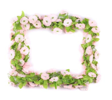 Frame of lilac artificial flowers. On a white background.