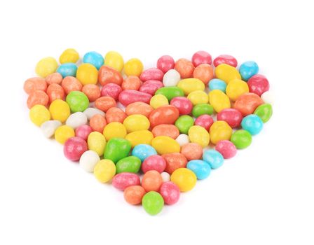 Heart of pills in color glaze. Isolated on a white background.