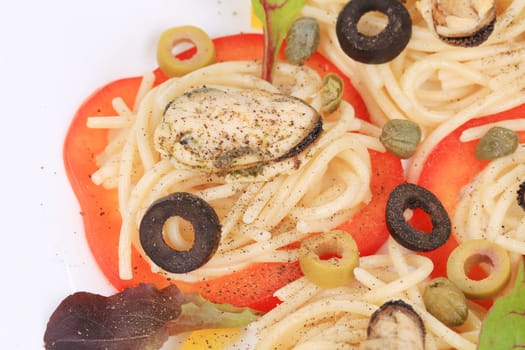 Sea salad with spaghetti. Located on the whole background.