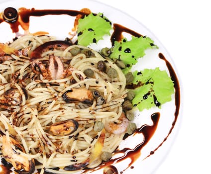 Sea salad with spaghetti. Located on the whole background.