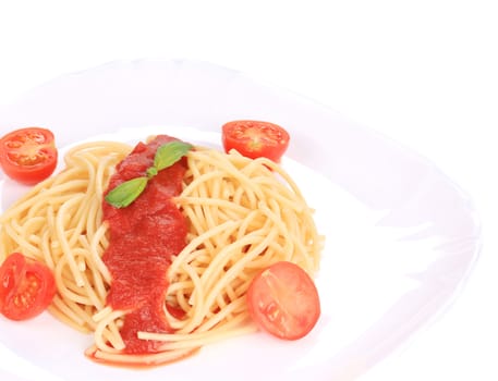 close up of spaghetti with tomato sauce and basil. isolated on a white background