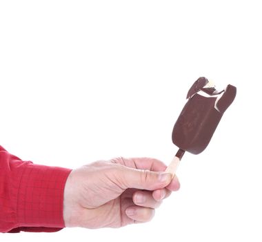 Hand holds bitten chocolate vanilla ice cream. Isolated on a white background
