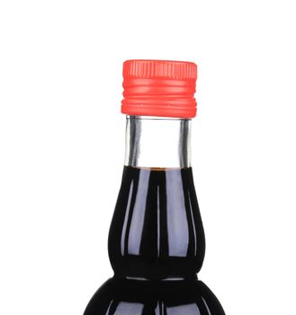 Soy sauce in a glass jar.