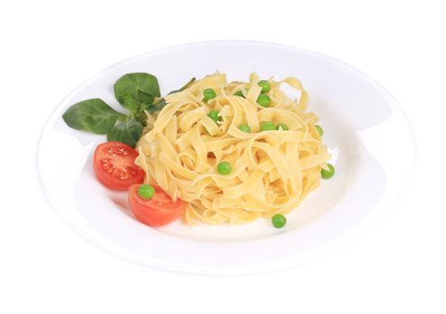 Tagliolini on plate close up. Isolated on a white background.