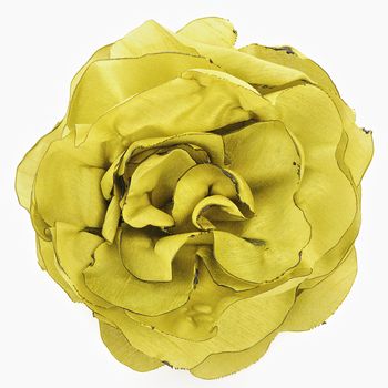 Artificial yellow flower of silk isolated on white background