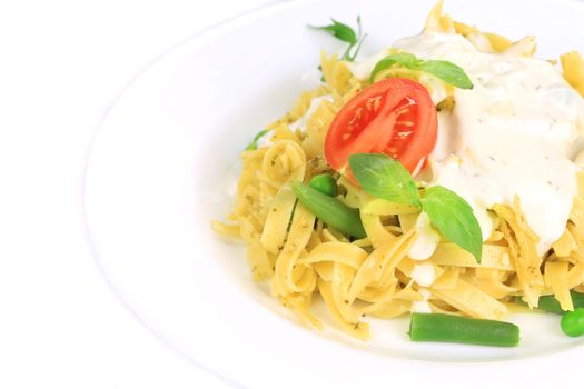 Pasta with dressing and green beans. Whole background.
