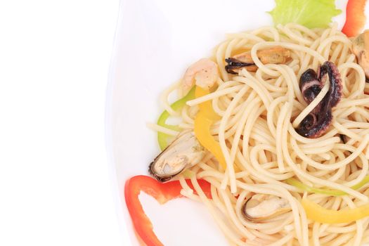 Sea salad with spaghetti. Isolated on a white background.