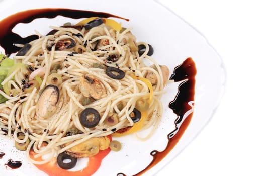Sea salad with spaghetti. Isolated on a white background.