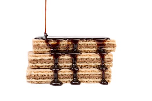 Coated stake wafers of chocolate. Isolated on a white background.