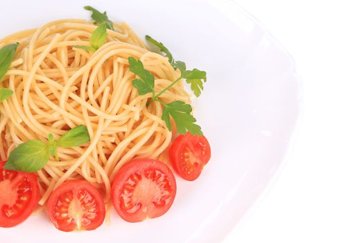 close up of spaghetti with tomato and basil. isolated on a white background