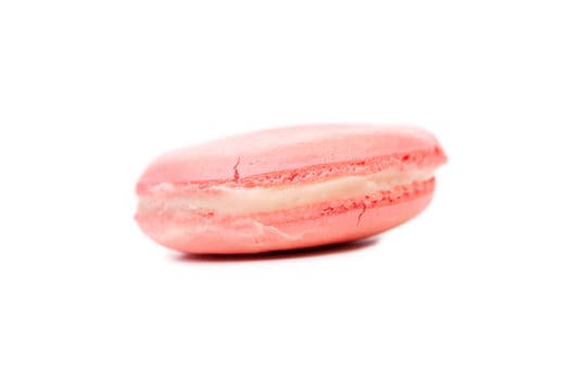 Close up of pink macaron cake. Isolated on a white background