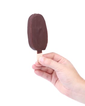 Hand holds chocolate vanilla ice cream. Isolated on a white background