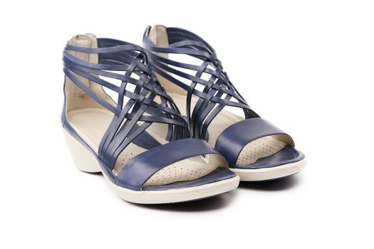Wicker black leather sandals. Isolated on a white background