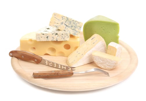 Cheeses on cutting board. Isolated o n awhite background.