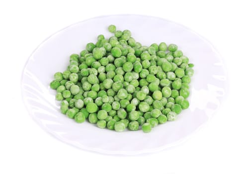Close up of frozen green peas. Isolated on a white background.