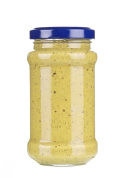 Glass jar of mustard. Isolated on a white background.