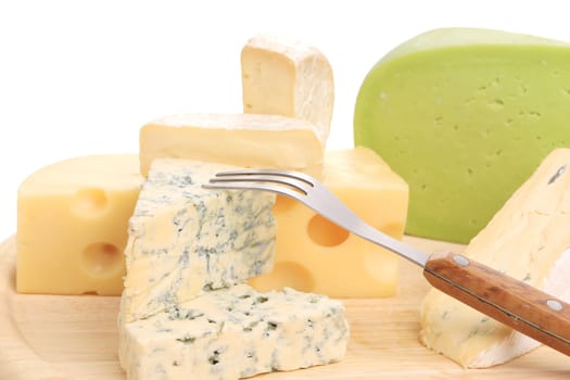 Different cheeses. Isolated on a white background.