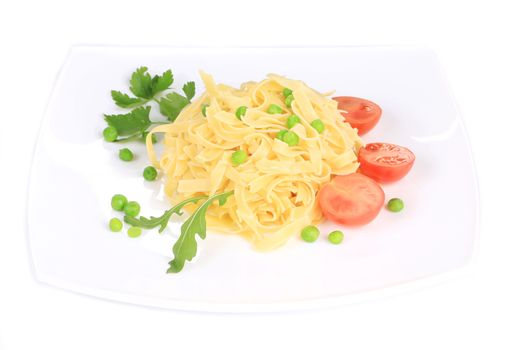 Pasta with green peas on plate close up. Isolated on a white background.