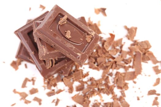 Grated chocolate. On a white background.
