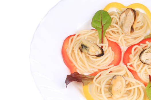 Sea salad with spaghetti. Isolated on a white background.
