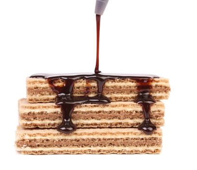 Coated stake wafers of chocolate. Isolated on a white background.