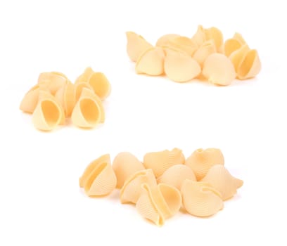 Bunches of Italian pasta shells. isolated on white background
