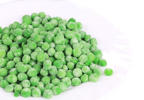 Close up of frozen green peas. Whole background.