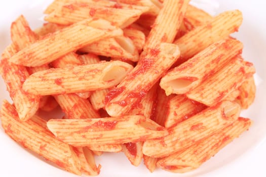 Pasta with tomato sauce. Close up. Whole background.