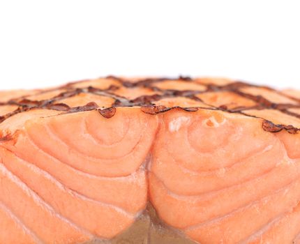 Close up of grilled salmon fillet. Whole background.