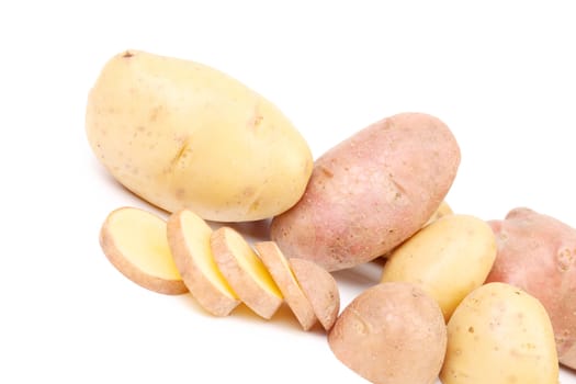 Different potatoes and split tuber. Isolated on a white background.